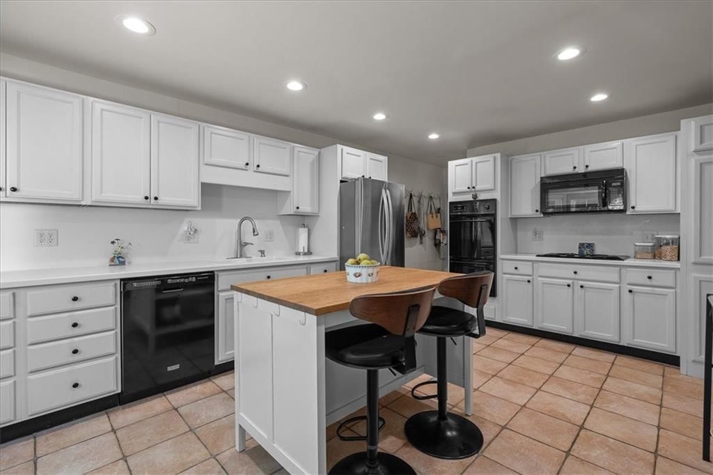 1215 W 69th Terrace — photo 13