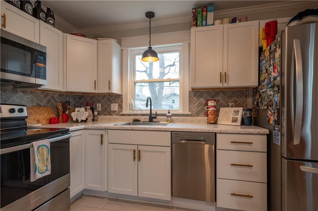 1209 E 25th Avenue — photo 12