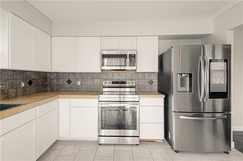 1315 TRACY Avenue — photo 11