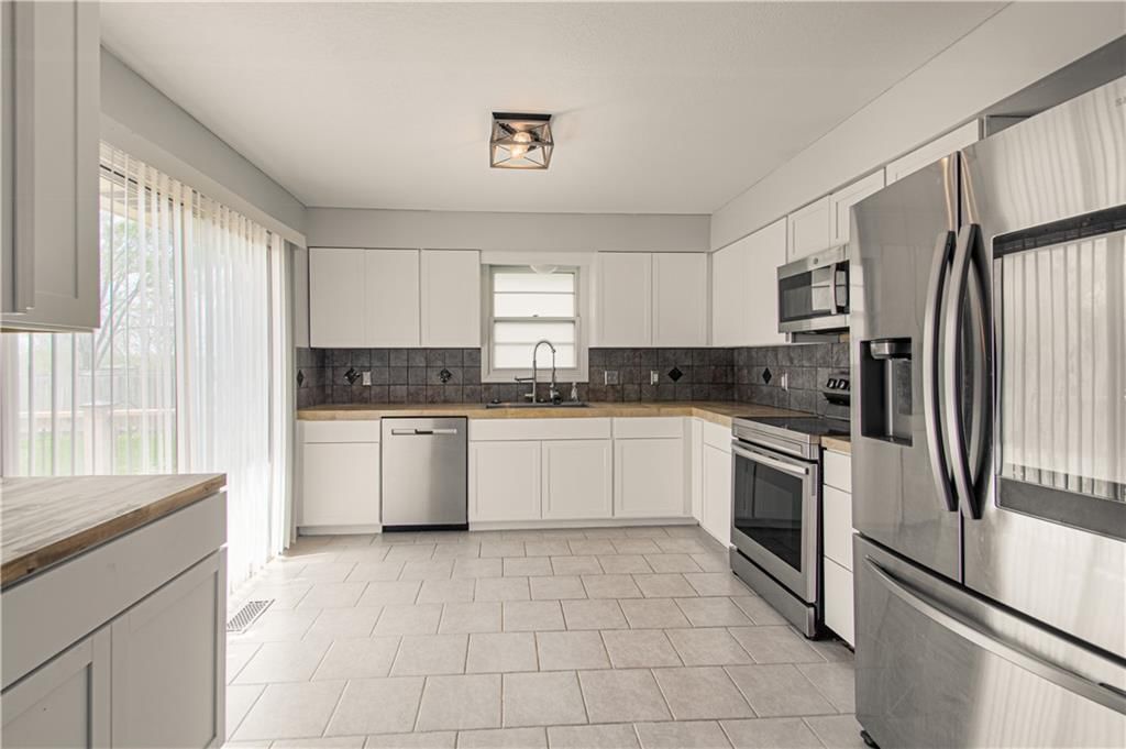1315 TRACY Avenue — photo 9
