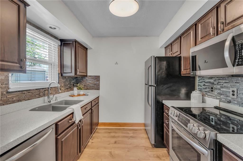 8272 NW Barrybrooke Drive — photo 10