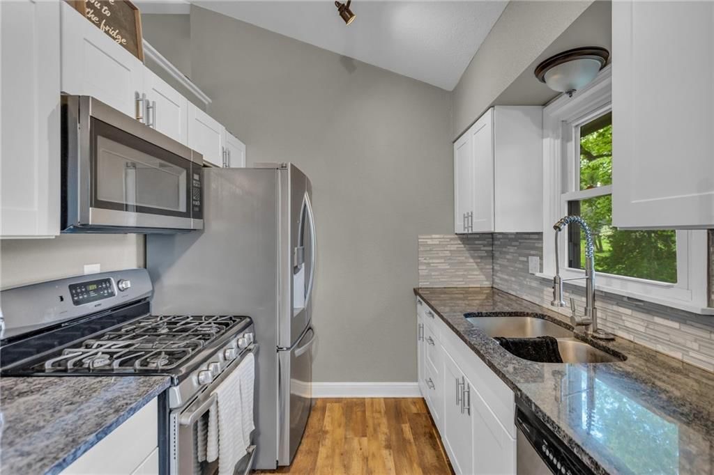 10806 W 71st Place — photo 5