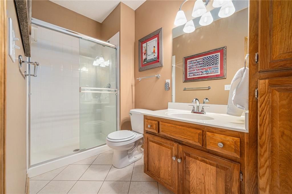 5715 NW Michaels Cove — photo 23