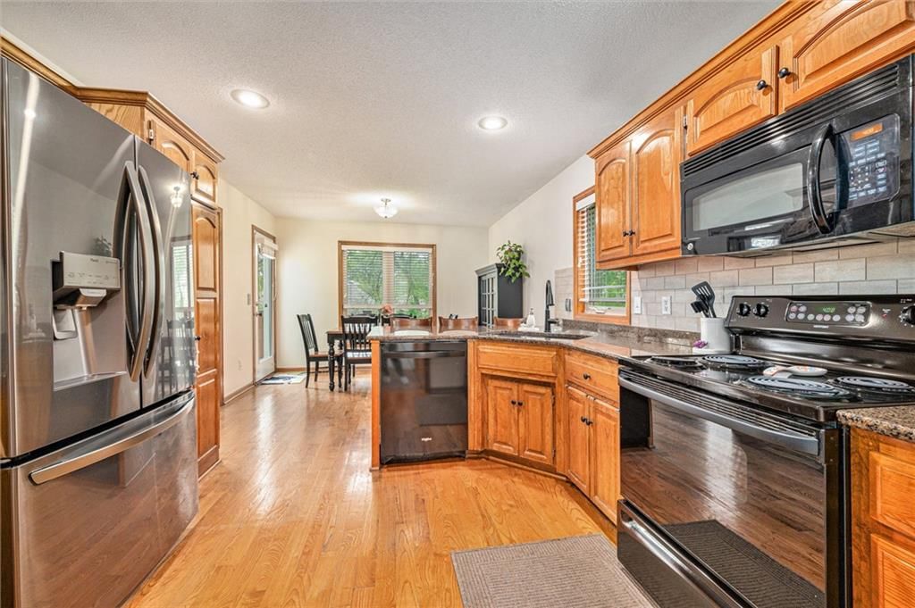 5715 NW Michaels Cove — photo 7