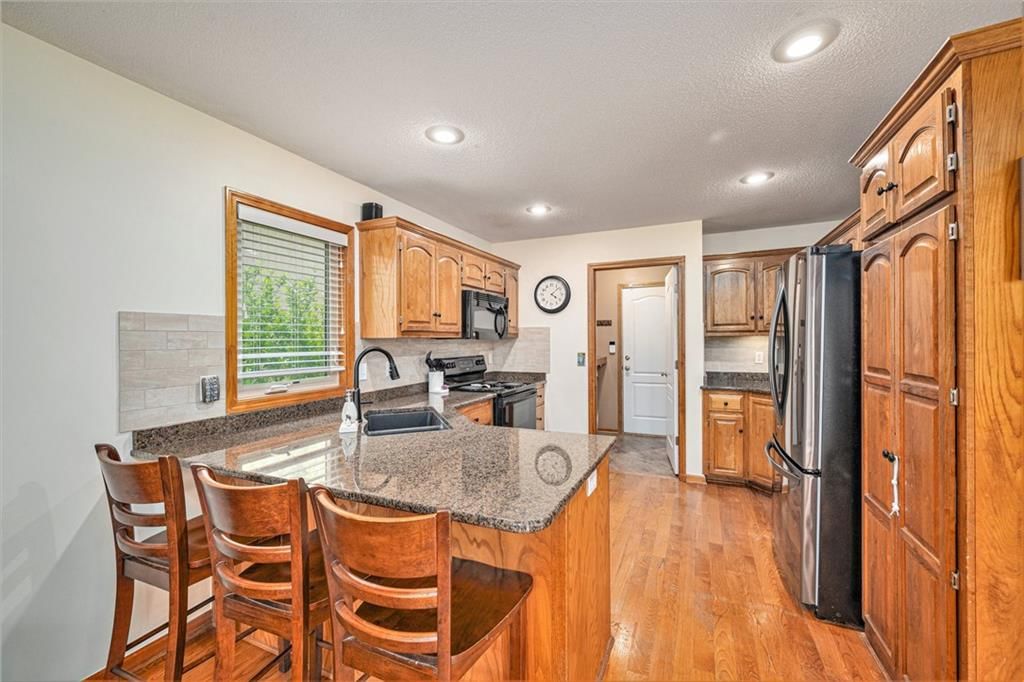 5715 NW Michaels Cove — photo 8