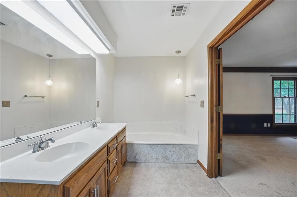 4413 NW Claymont Woods Drive — photo 19