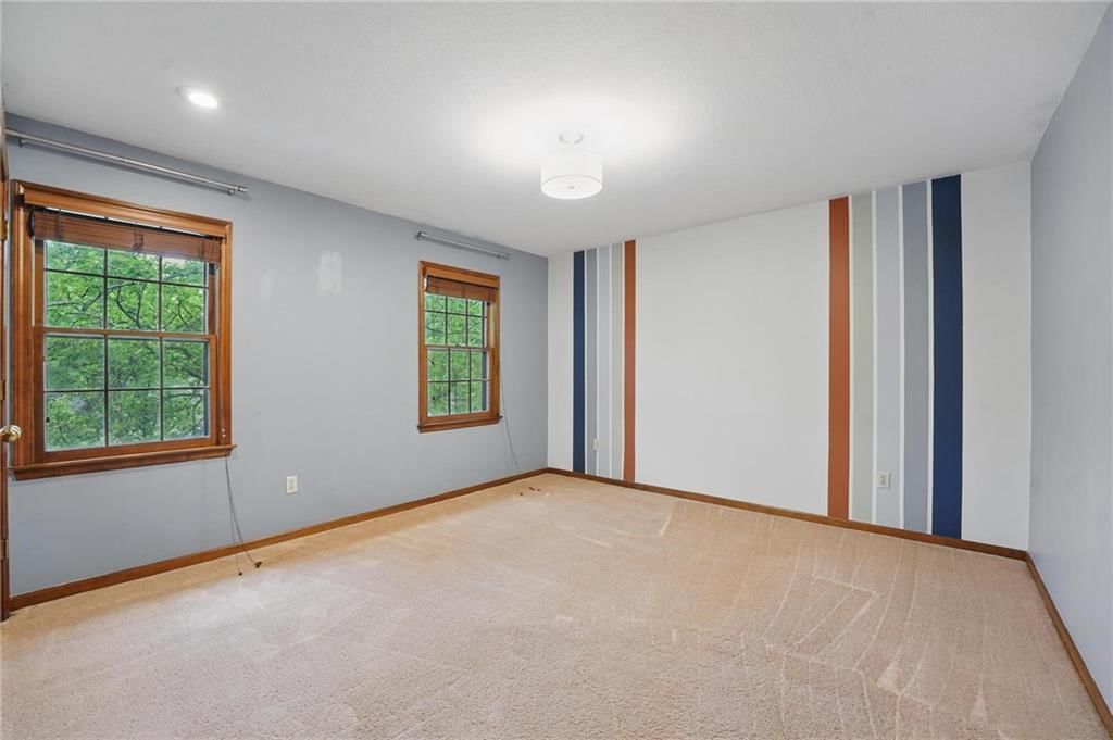 4413 NW Claymont Woods Drive — photo 21