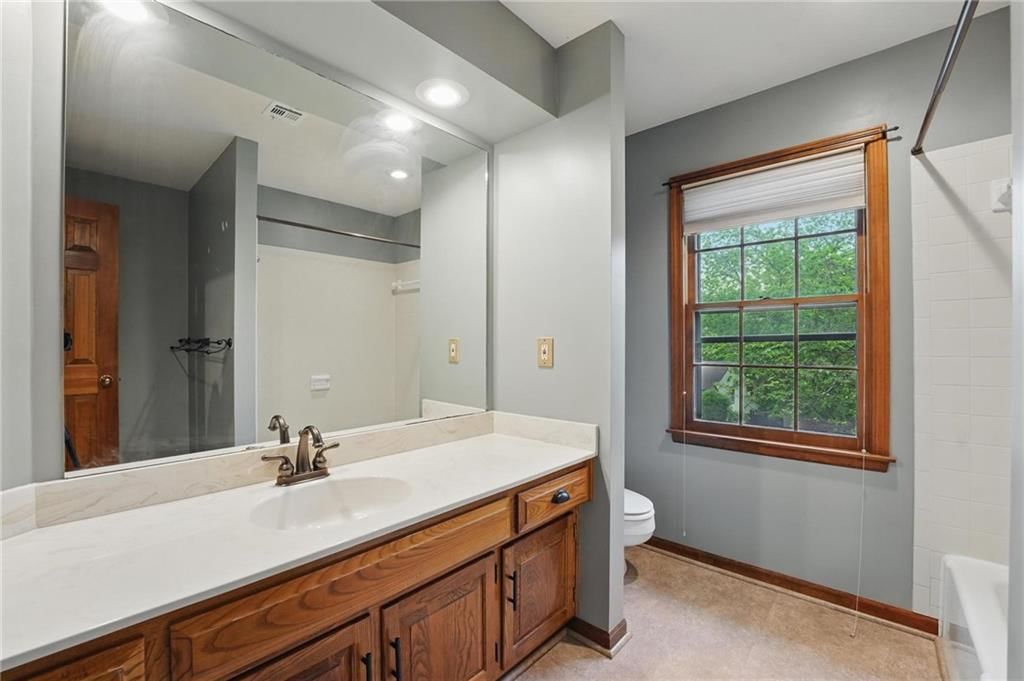 4413 NW Claymont Woods Drive — photo 23