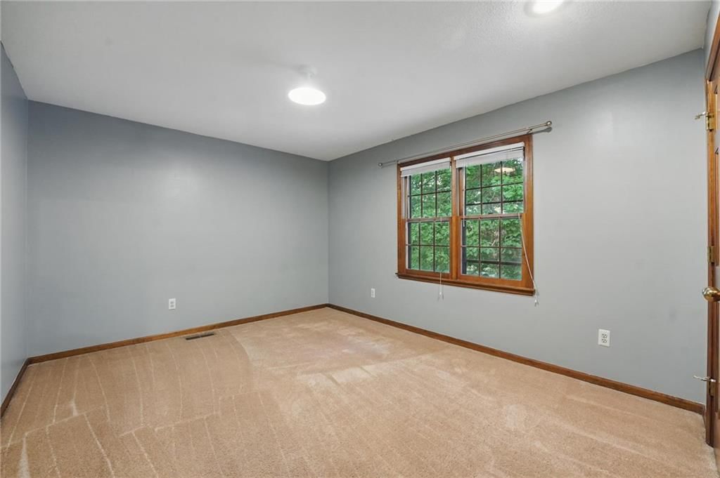 4413 NW Claymont Woods Drive — photo 24
