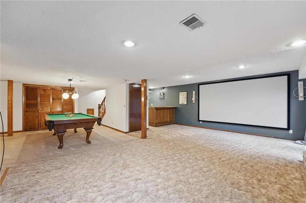 4413 NW Claymont Woods Drive — photo 28