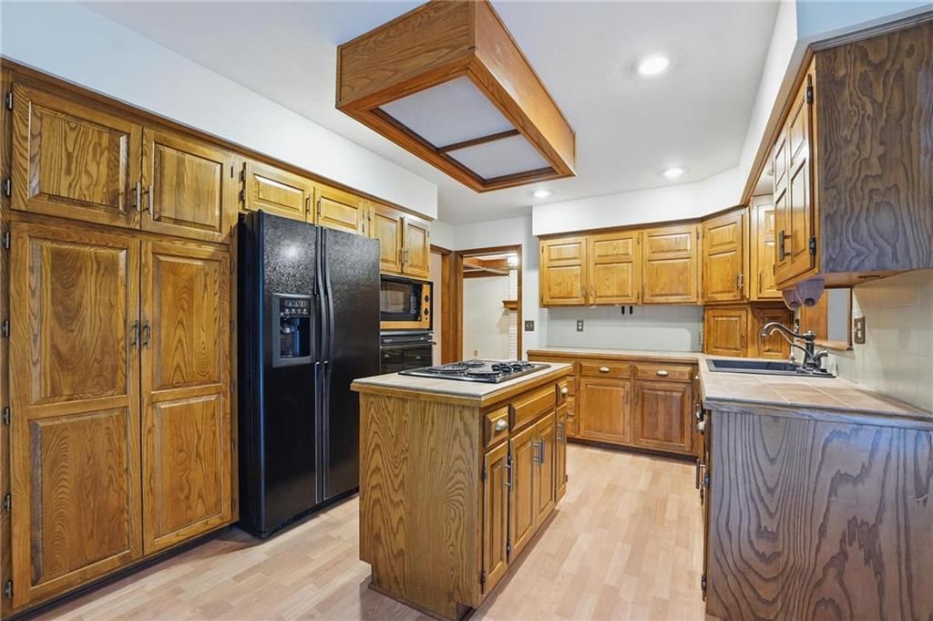 4413 NW Claymont Woods Drive — photo 8