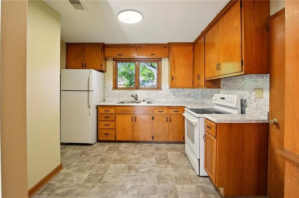 8306 James A Reed Road — photo 14