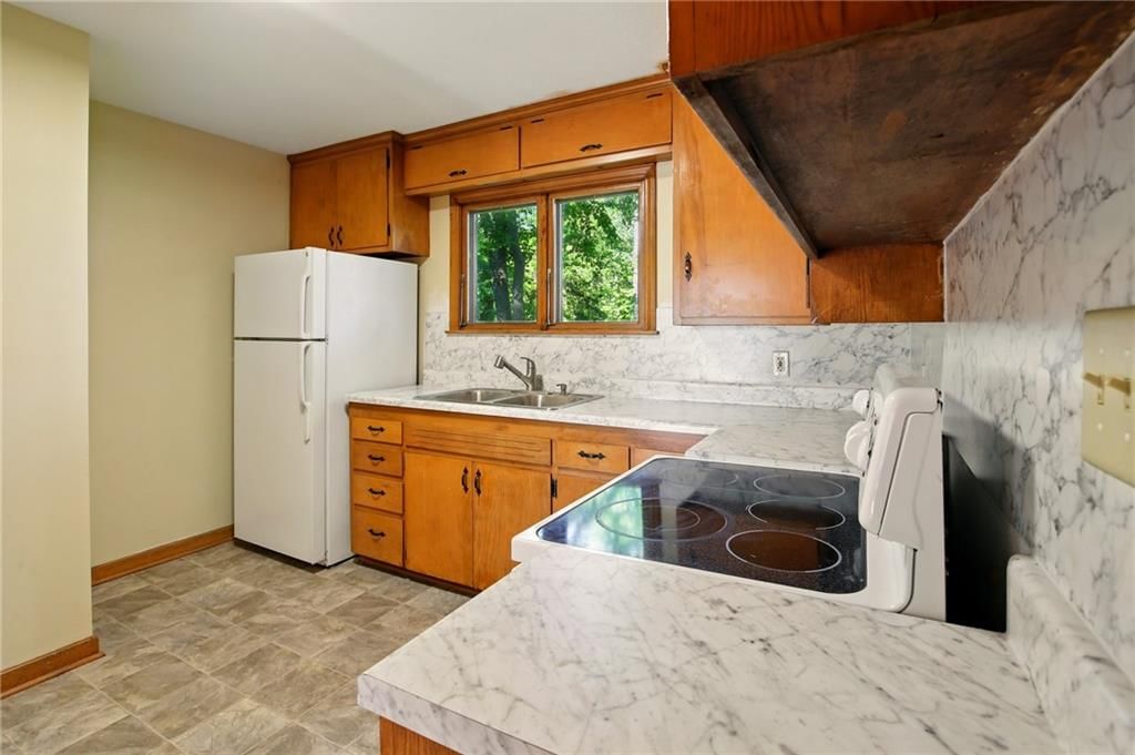 8306 James A Reed Road — photo 15