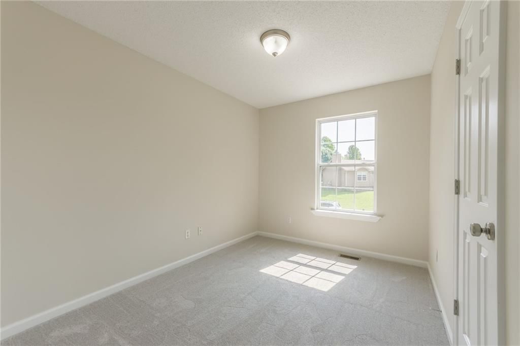 10715 N Booth Avenue — photo 16