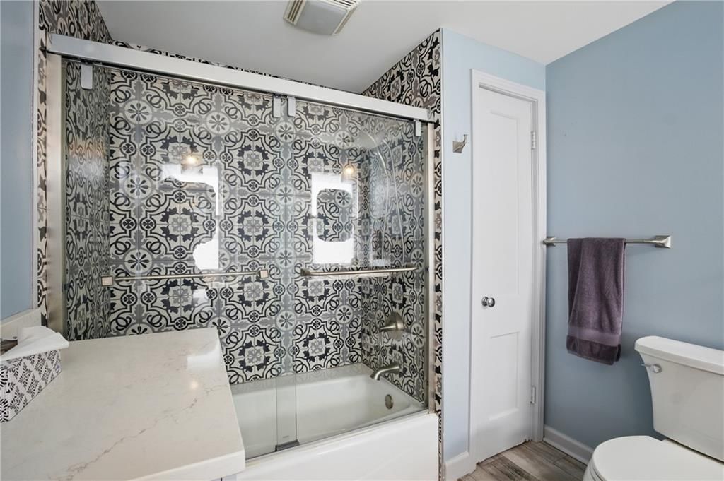 440 E 74th Terrace — photo 25
