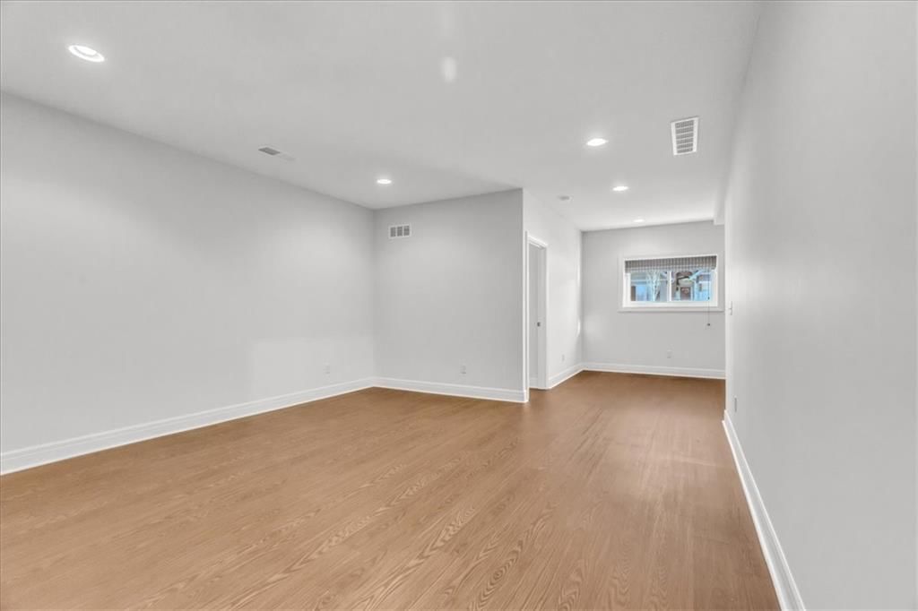 1718 NE Chapel Woods Drive — photo 18