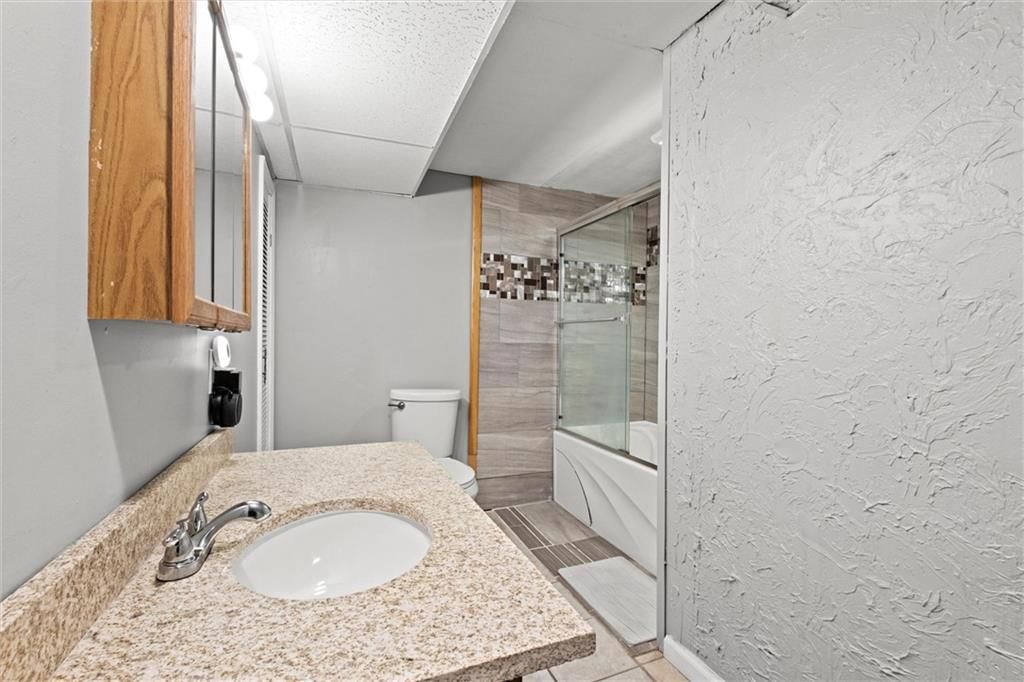5712 NW Raintree Drive — photo 26