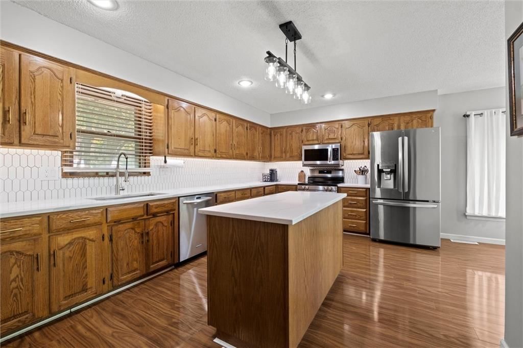 5712 NW Raintree Drive — photo 9