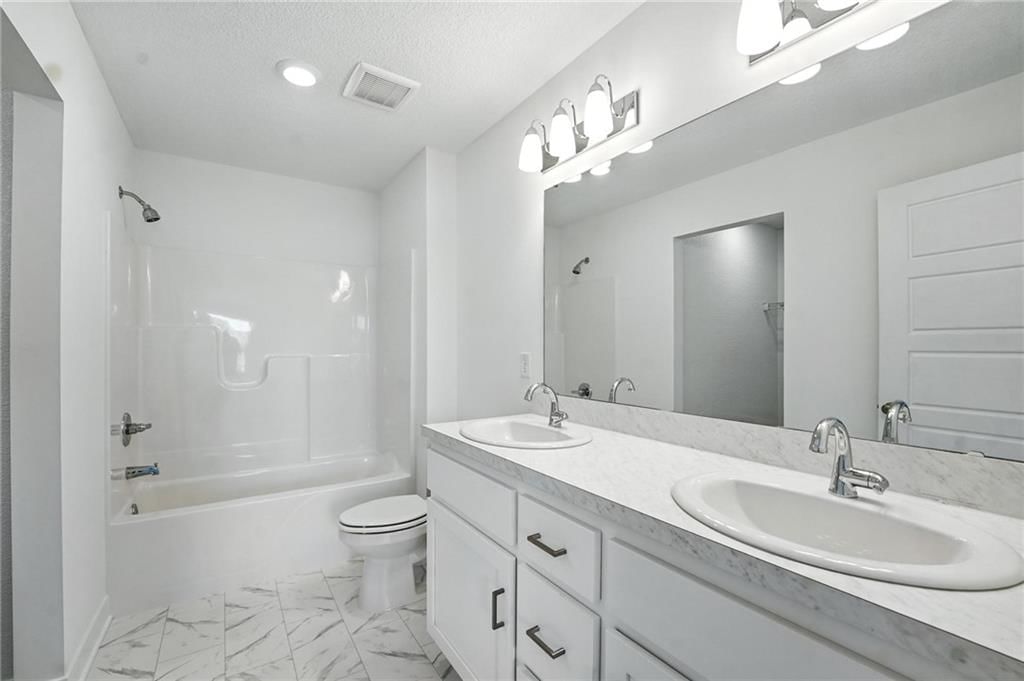 8716 SW Brickell Drive — photo 16
