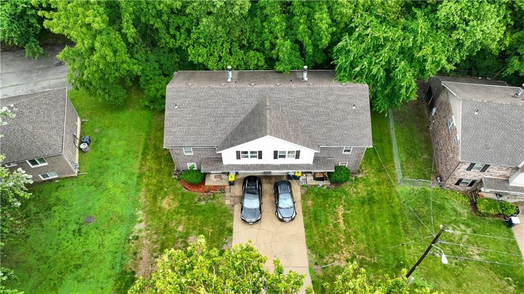 5709-5711 NW Hillside Drive — photo 2