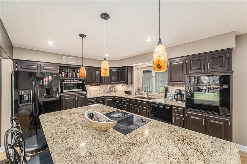 807 NW Bent Tree Drive — photo 11