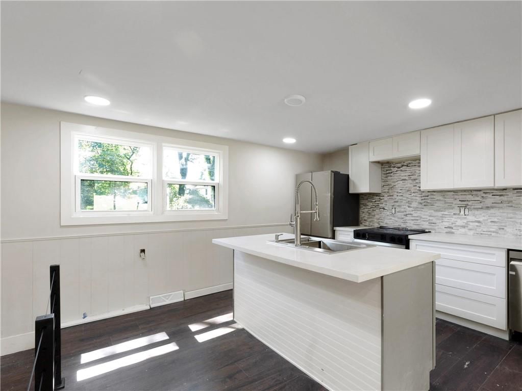 5013 NW Ridgewood Drive — photo 6
