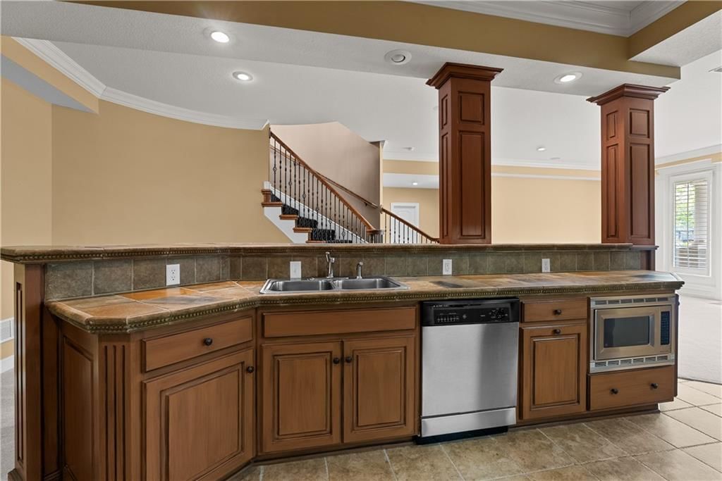 4605 NE DICK HOWSER Circle — photo 40