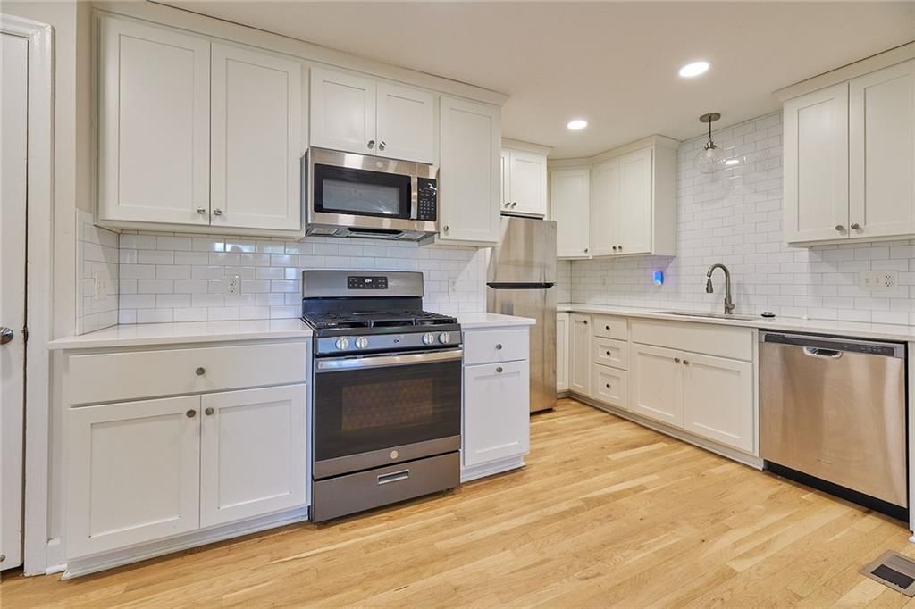 1221 W 25th Street — photo 8