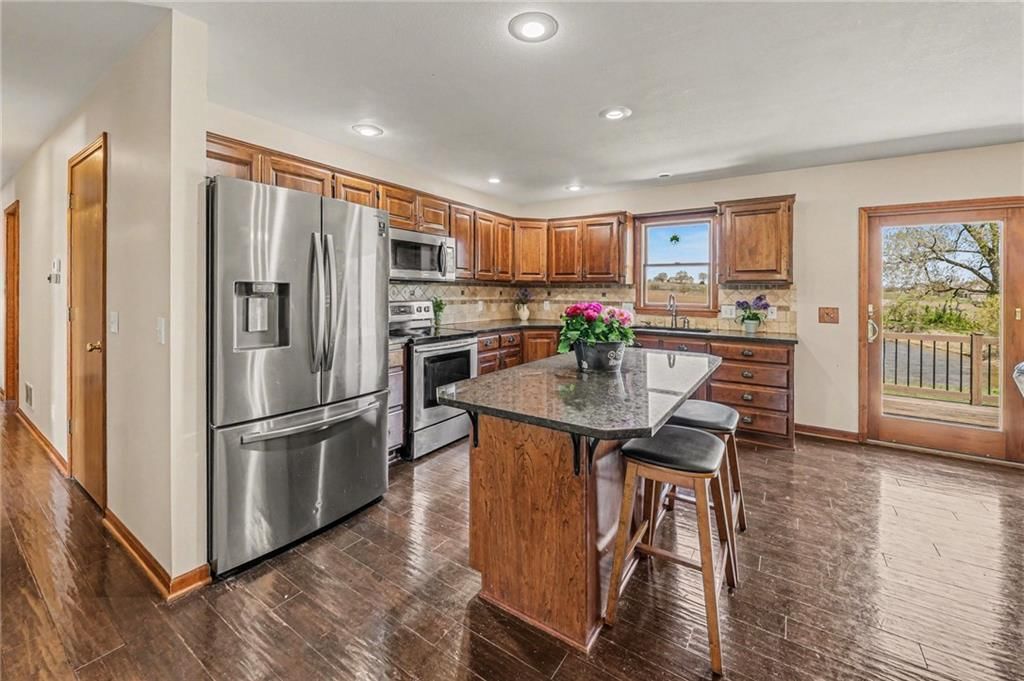 9670 NW DAWN Lane — photo 9