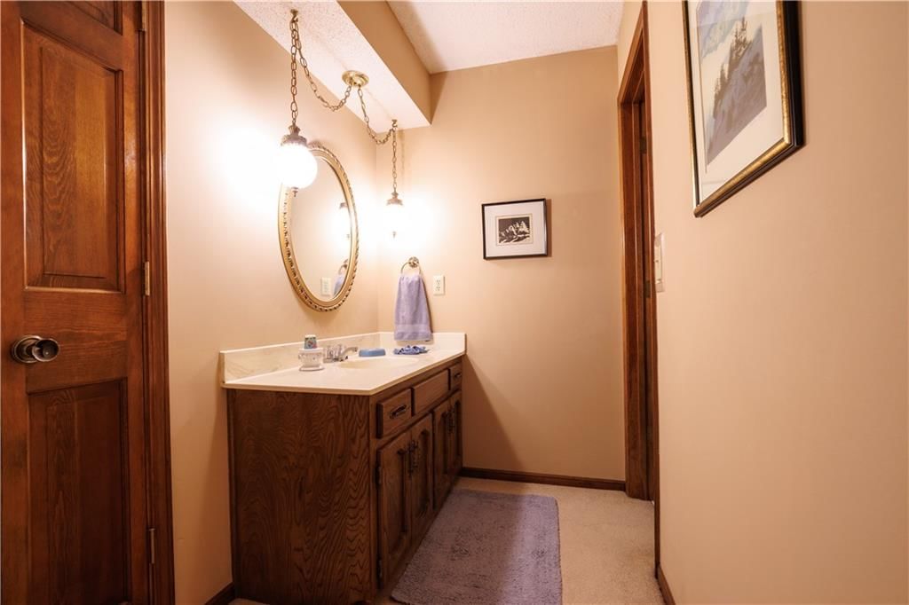 5611 NW Oak Ridge Court — photo 27