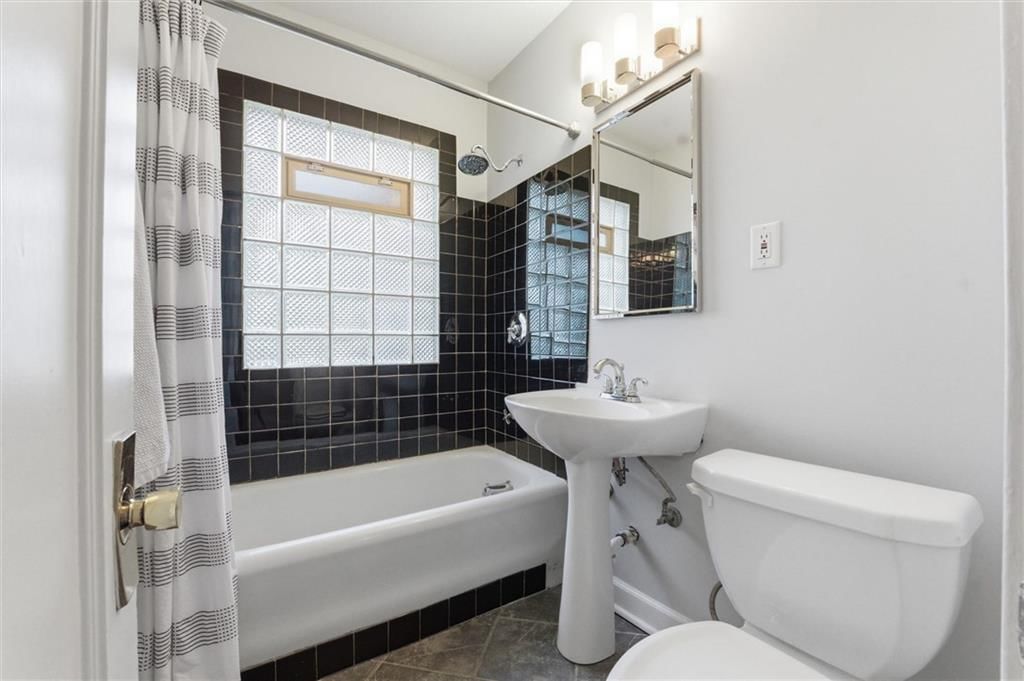 106 E 65th Terrace — photo 15