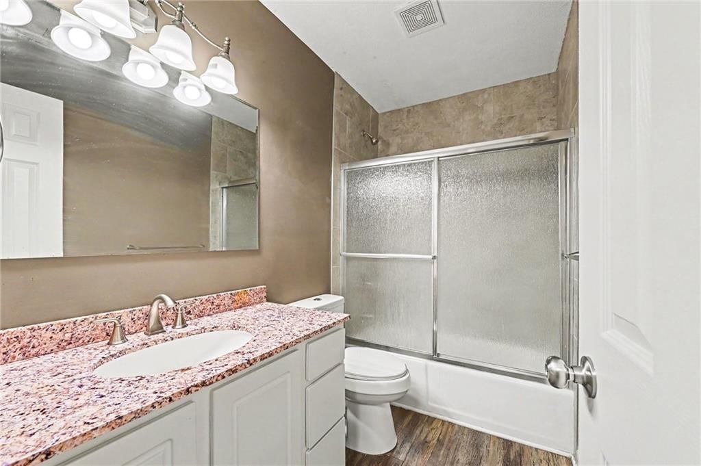 7104 NW Chapel Woods Lane — photo 8