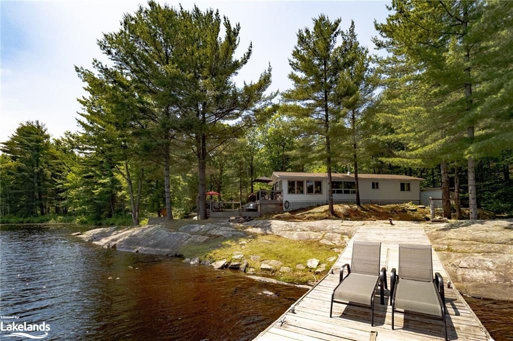 Single Family Residence sold at 293 Nine Mile Lake Island, Torrance, ON, P0C 1M0 - Wood - MLS: 40282926
