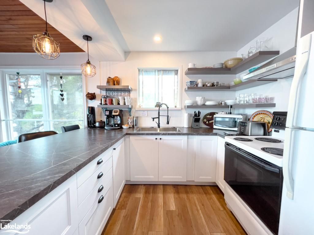 Single Family Residence sold at 15 Finn Road, Whitestone, ON, P0A 1G0 - Dunchurch - MLS: 40327465