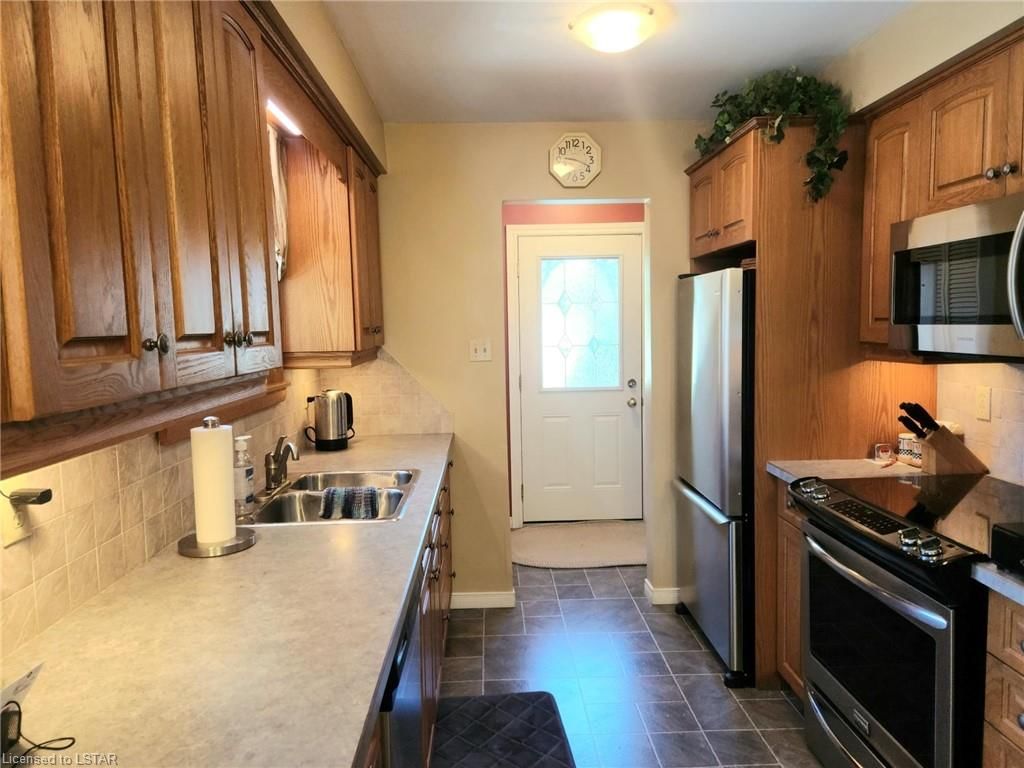 Single Family Residence sold at 13 Locke Avenue, St. Thomas, ON, N5P 3X5 - NW - MLS: 40468194