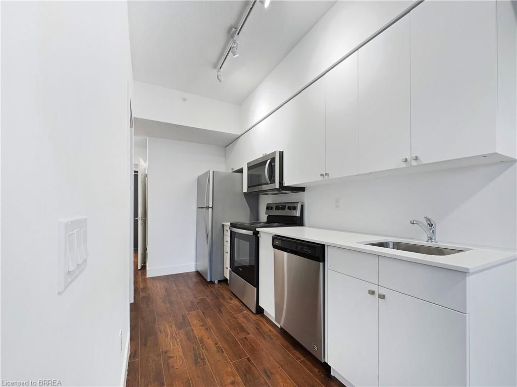 Condo/Apt Unit sold at 401-1 Wellington Street, Brantford, ON, N3T 2L3 - Downtown Core - MLS: 40519284