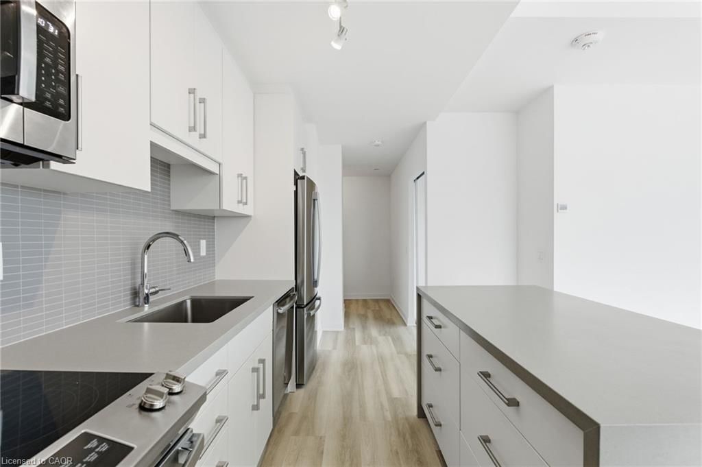 Condo/Apt Unit sold at 404-2007 James Street, Burlington, ON, L7R 0G7 - Central - MLS: 40789641