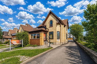 upper - 561 Queen Street S