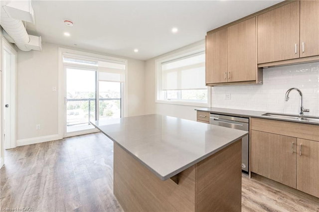 203 - 72 Erb Street E