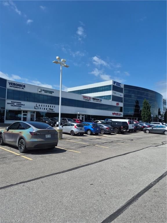 211 - 1100 South Service Road