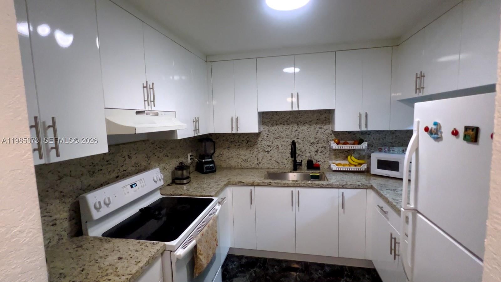 1900 W 68TH ST, Unit D207 - 1