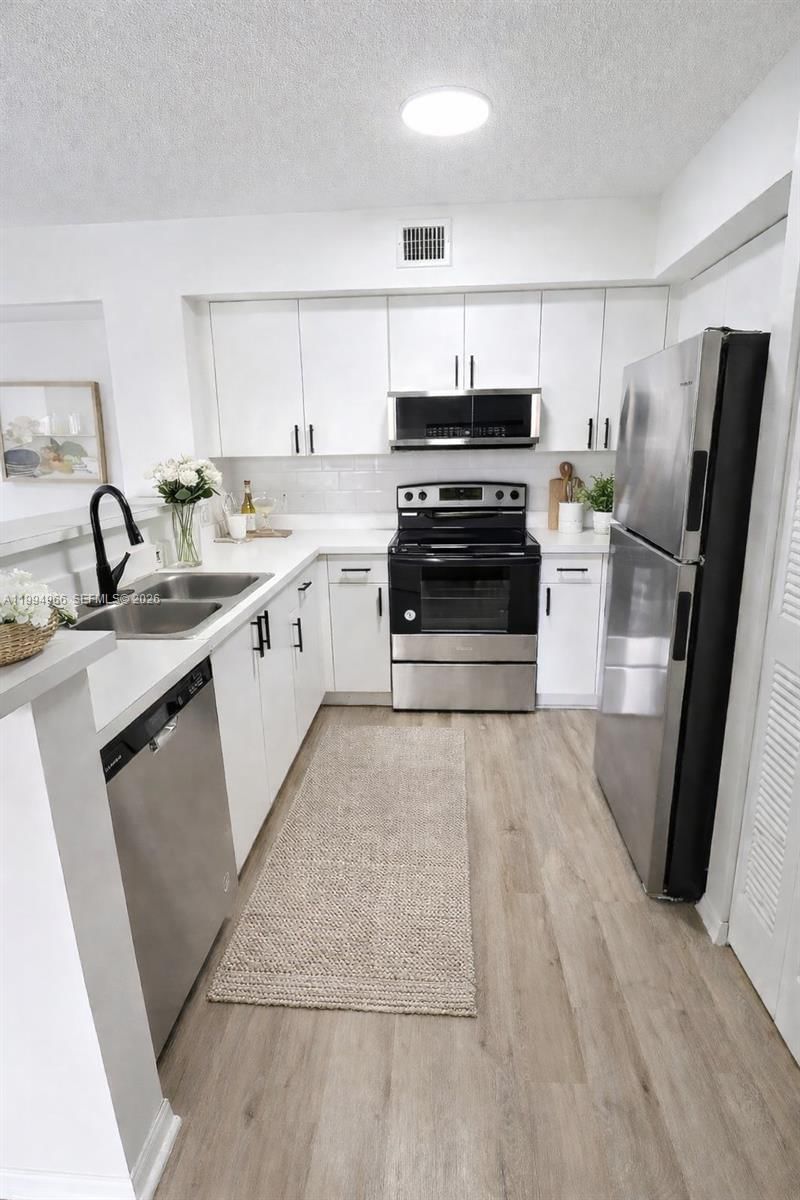 12166 ST ANDREWS PL, Unit 108 - 1