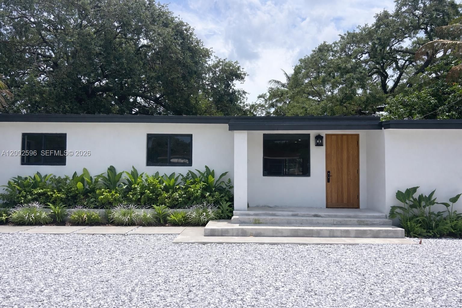 1242 NE 145TH ST - 1