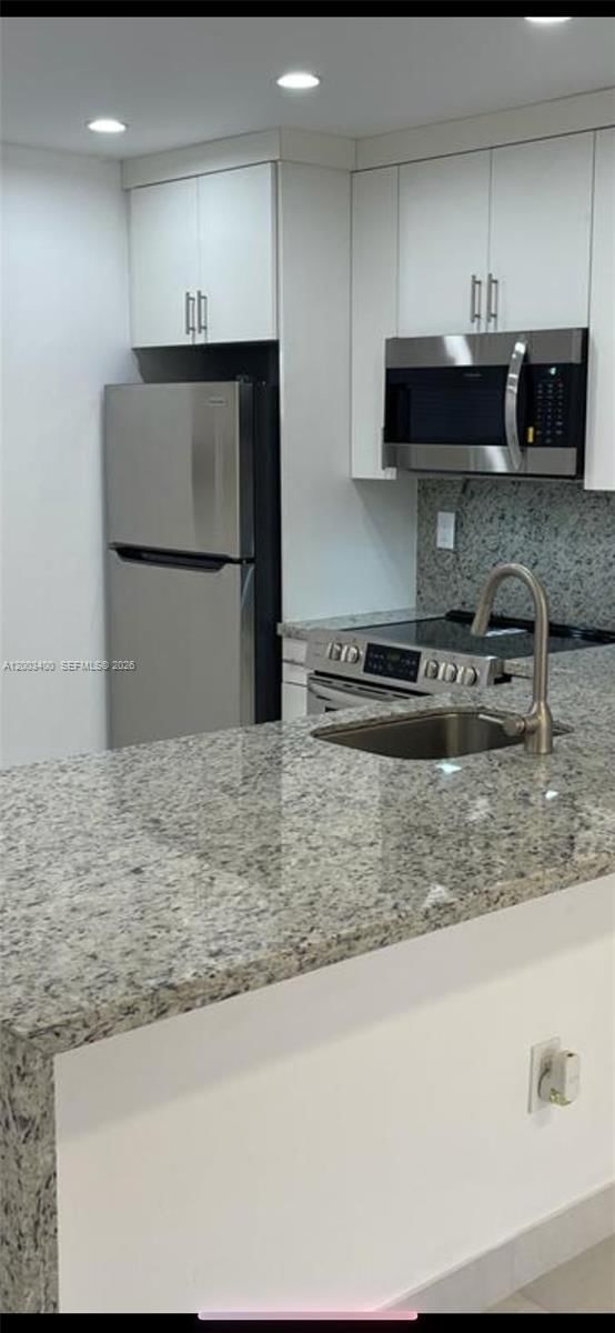 7732 CAMINO REAL, Unit F-318 - 1