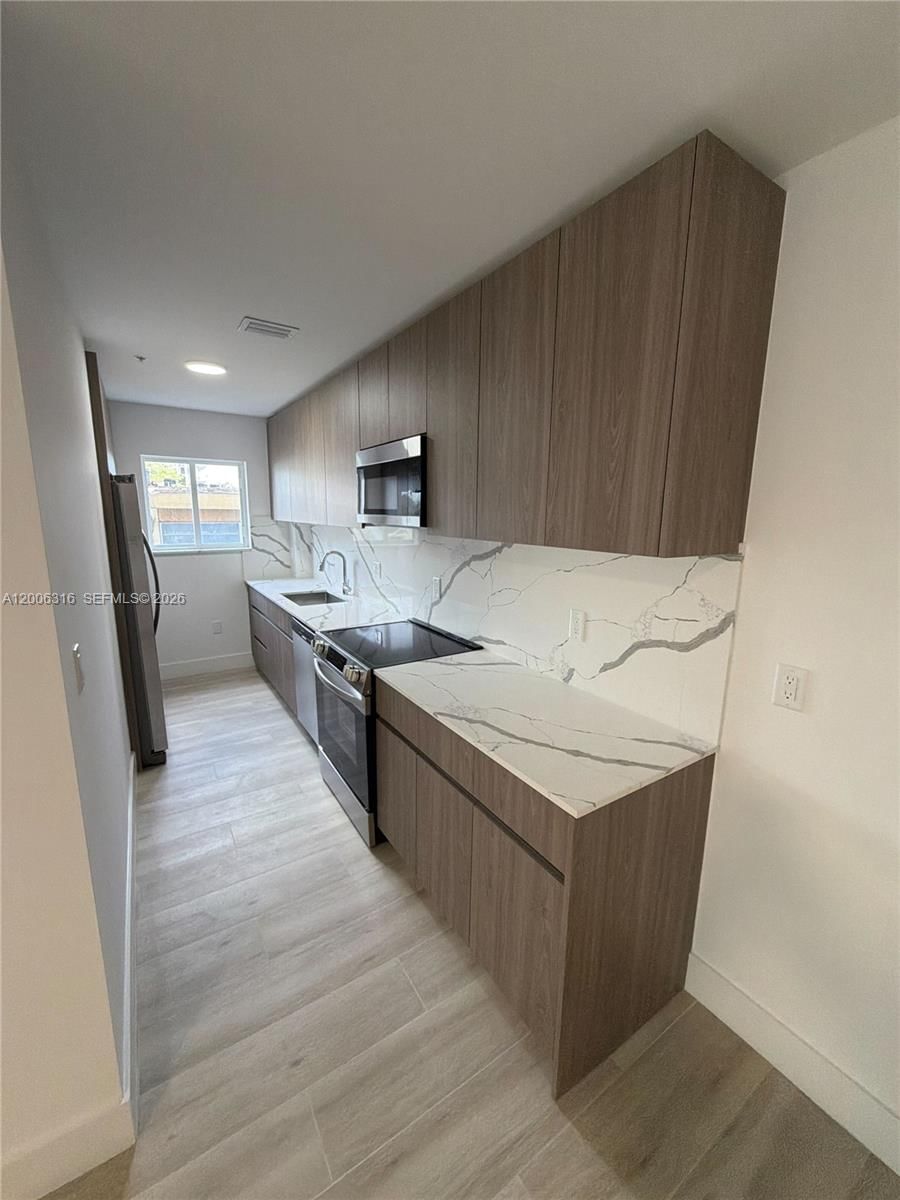 32 NW 14TH AVE, Unit 203 - 1