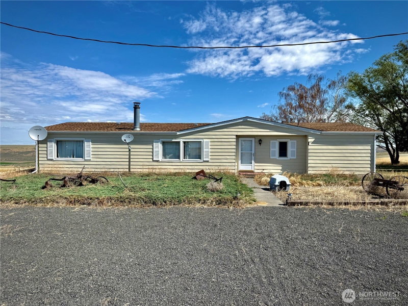 7603 Coyote Heights Road N photo 1
