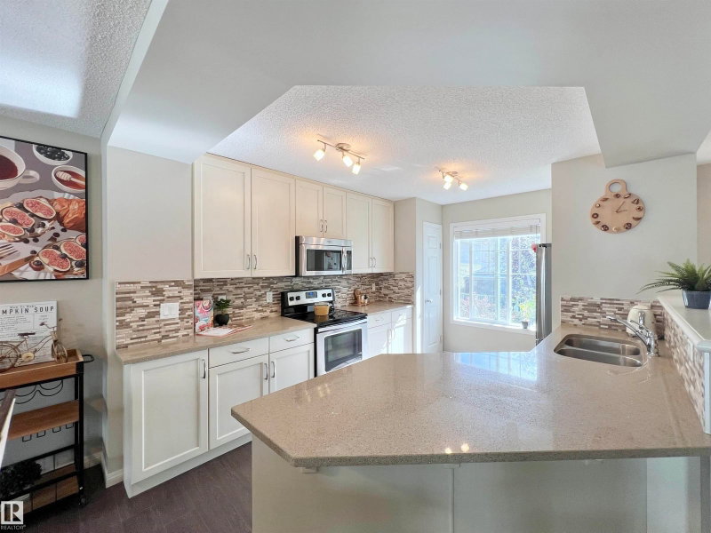 A unit for sale at 7385 Edgemont Way NW