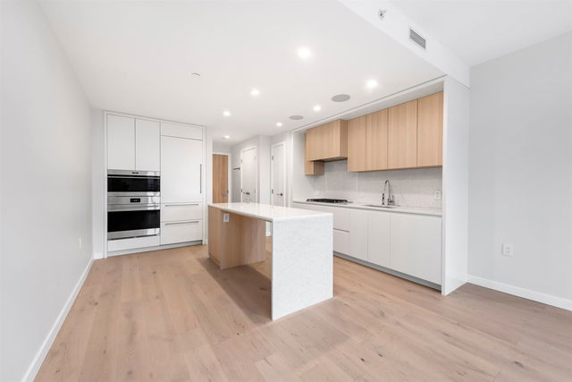 2302 - 7433 Cambie Street
