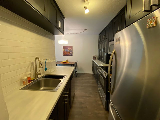 218 - 750 7th Avenue