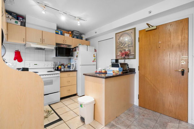 504 - 6611 Cooney Road